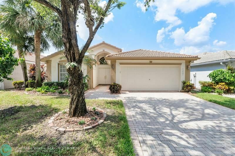 Property Photo:  11721 Castellon Ct  FL 33437 