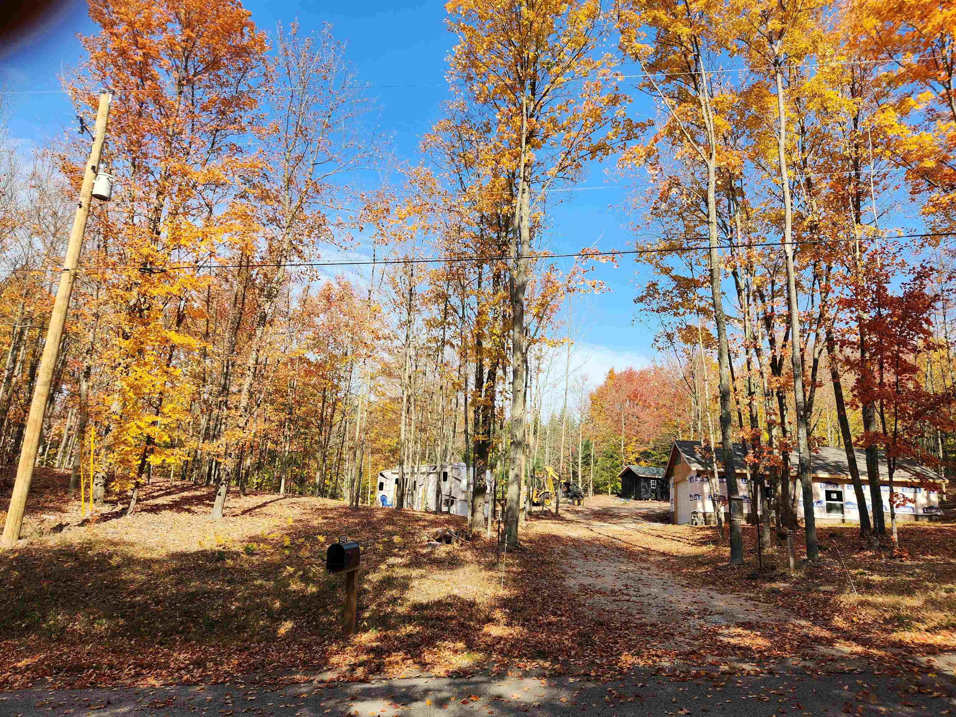 Property Photo:  6546 Six Mile Road  MI 49616-9779 