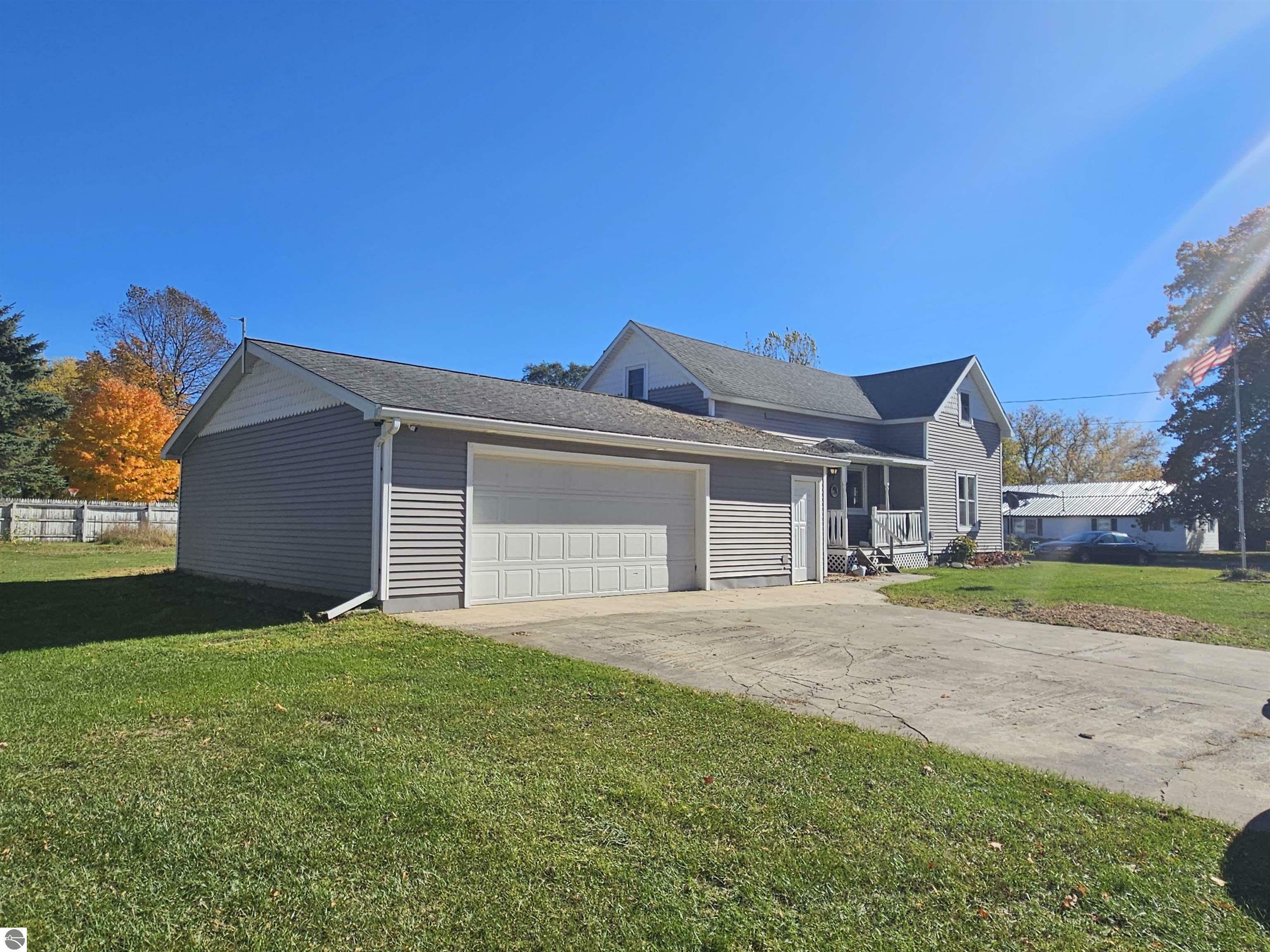 Property Photo:  218 Boon Street  MI 49618 