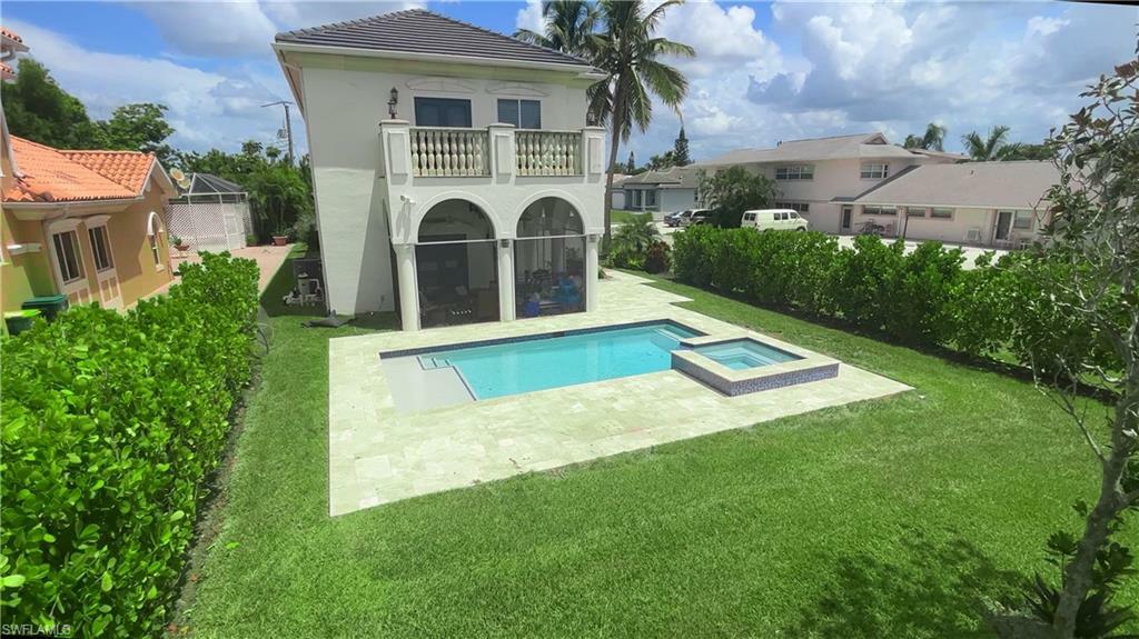 Property Photo: 11002 Vanderbilt Dr FL 34108