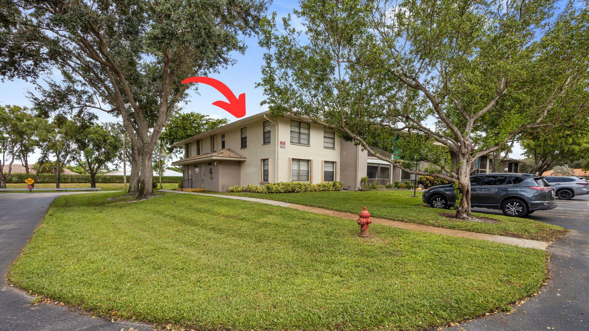 Property Photo:  9780 Pineapple Tree Drive 201  FL 33436 