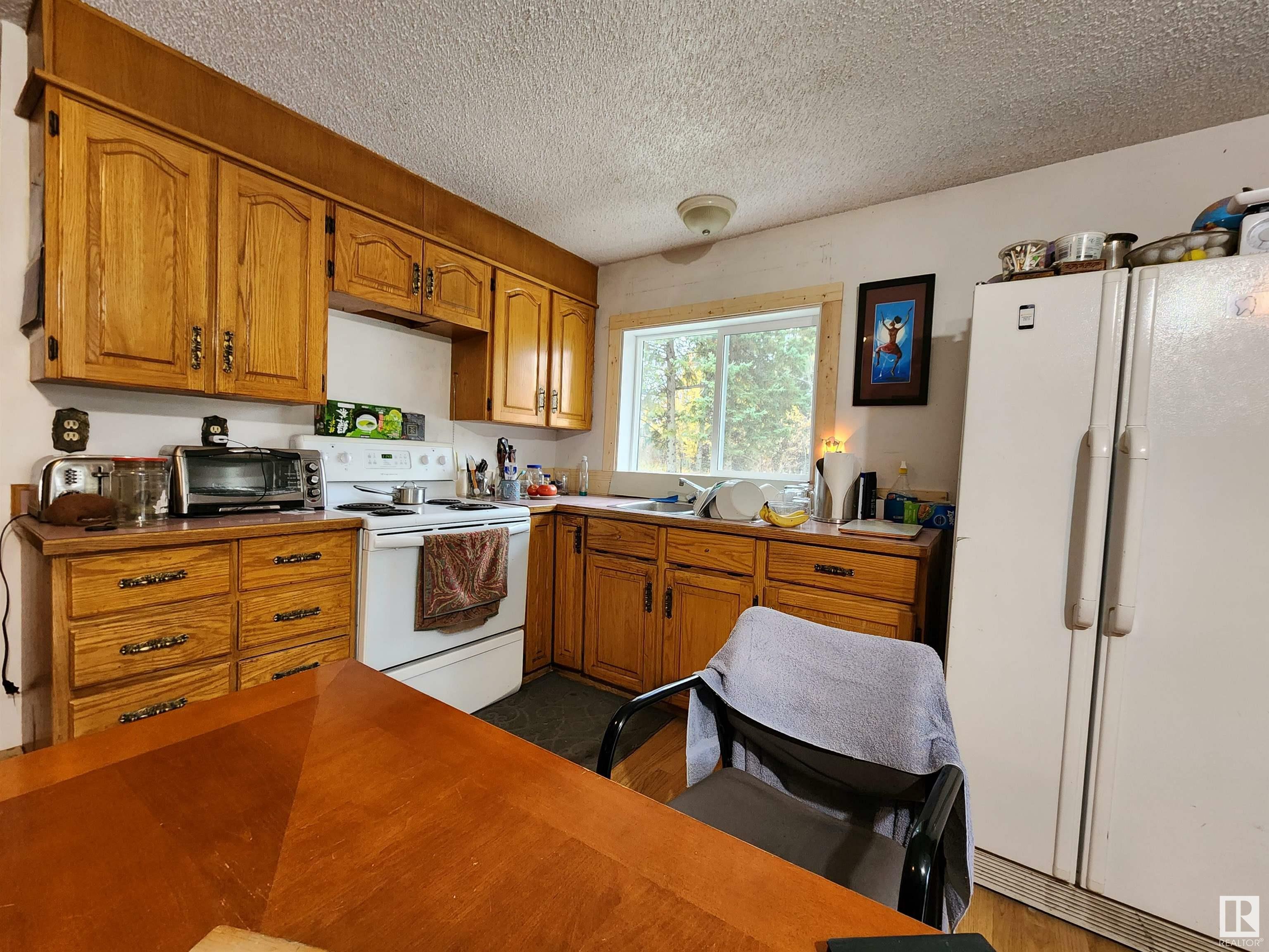 Property Photo:  473059 Hwy 2 A  AB T0C 1Z0 