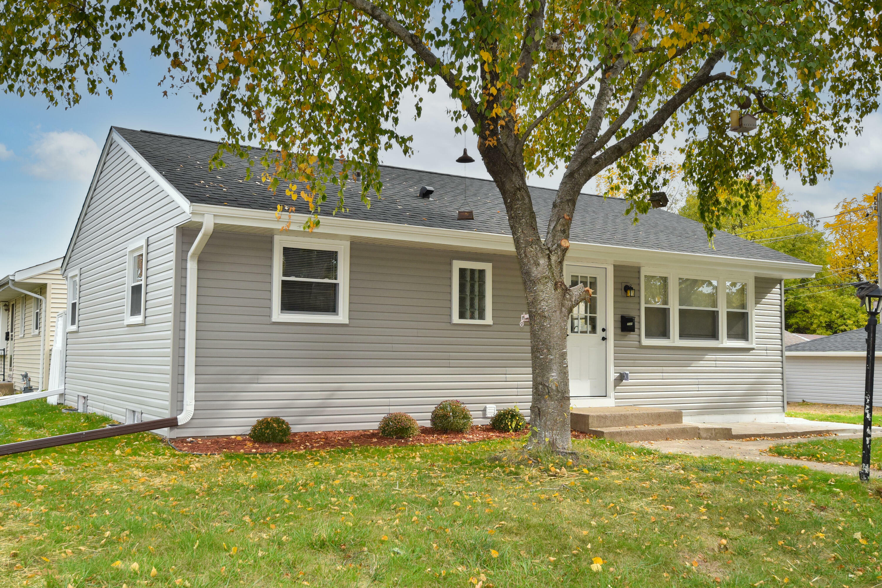 Property Photo:  7040 W Tallmadge Pl  WI 53218 