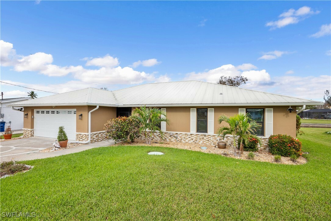 Property Photo: 6148 Plumosa Avenue FL 33908