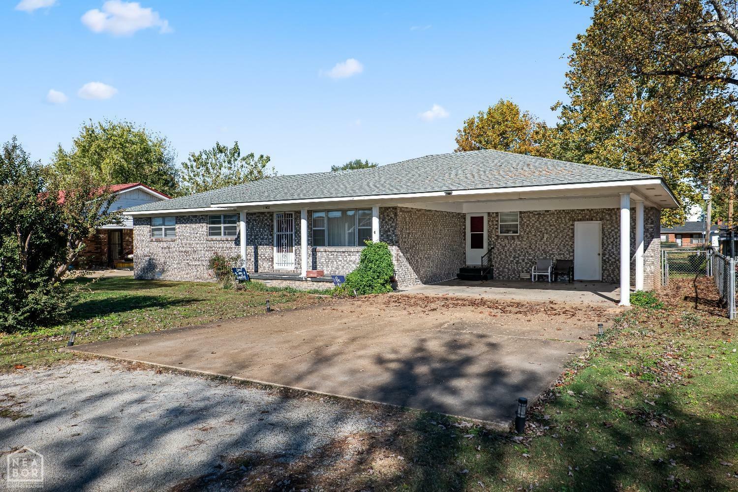 Property Photo:  1402 Magnolia Avenue  AR 72476 