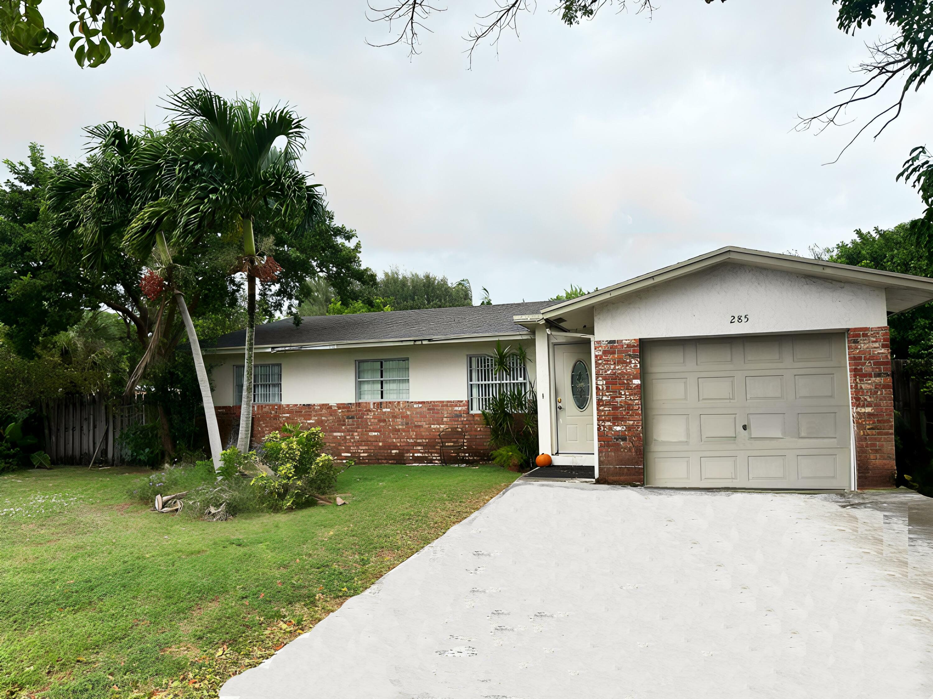 Property Photo:  285 NW 35th Street  FL 33431 