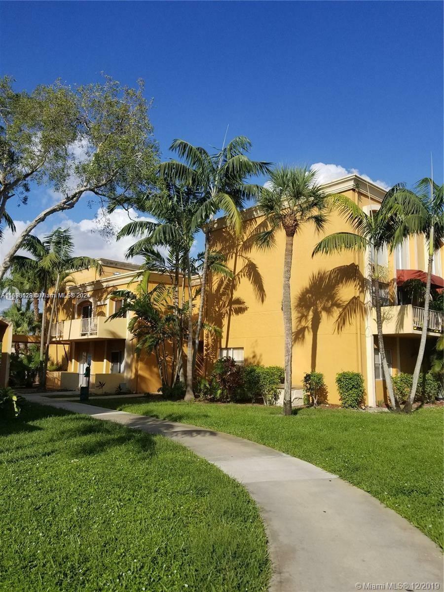 Property Photo:  18111 NW 68th Ave G209  FL 33015 