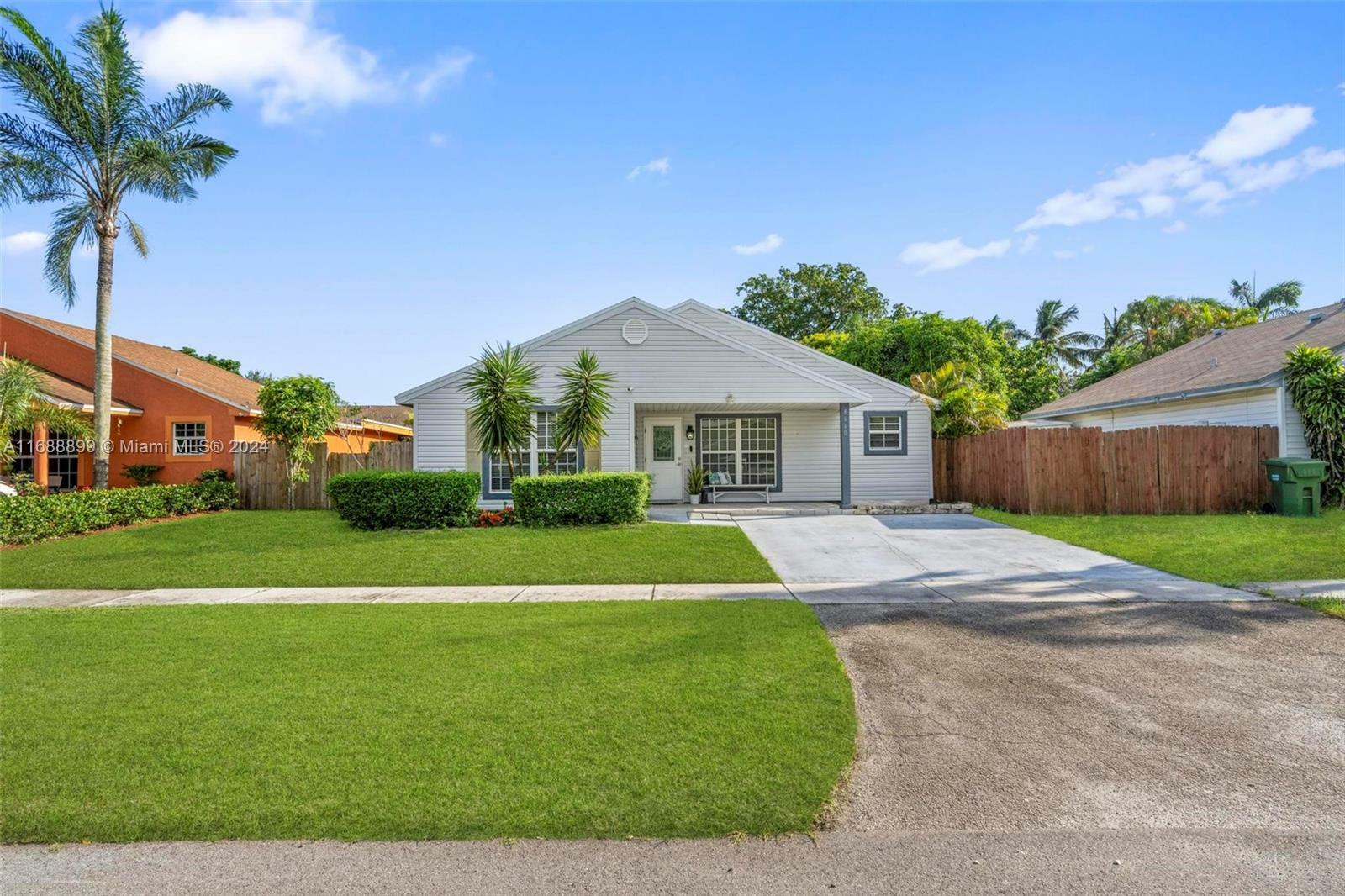 Property Photo:  8660 SW 16th St  FL 33025 