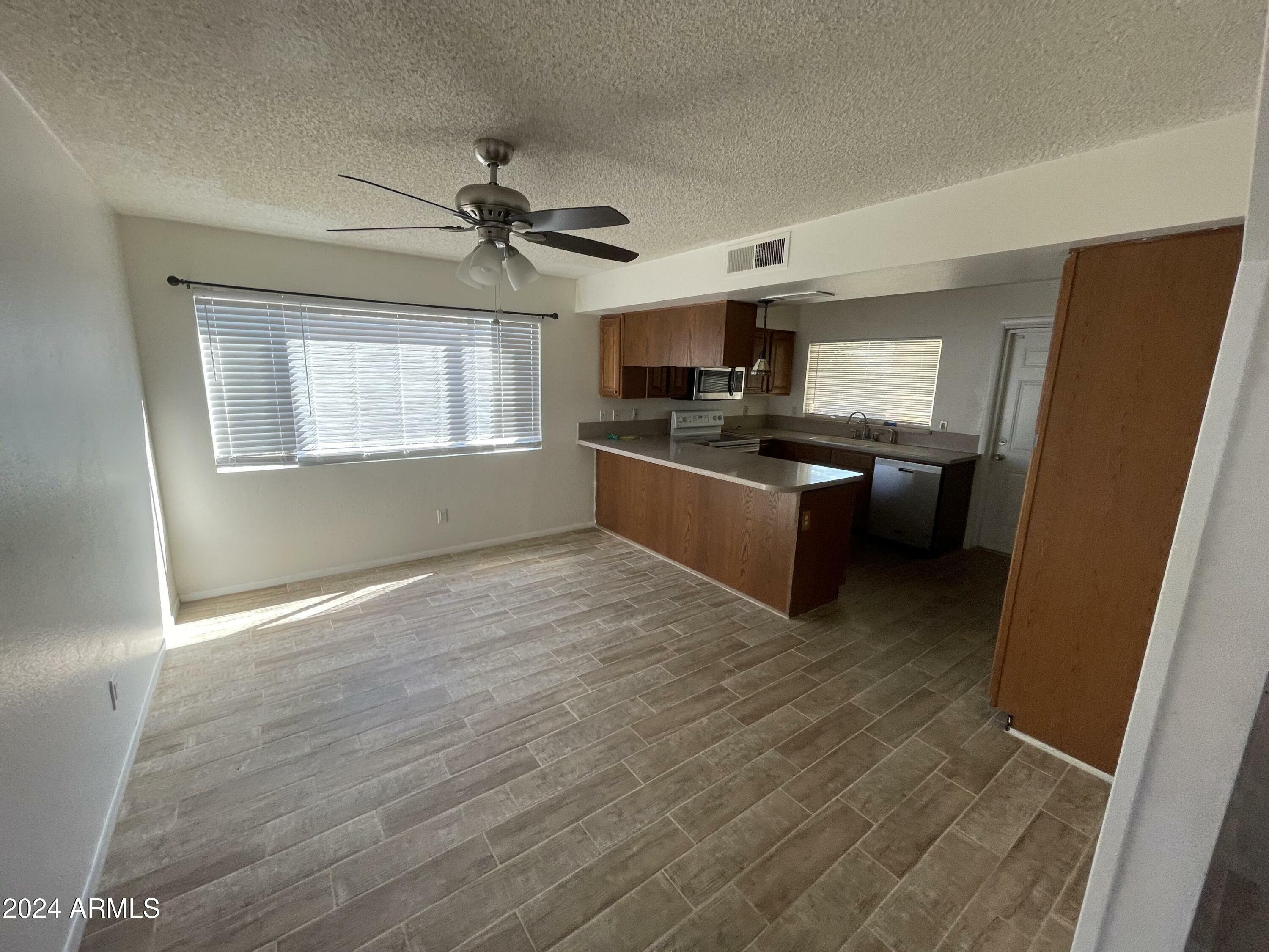 Property Photo:  7127 W Vogel Avenue  AZ 85345 