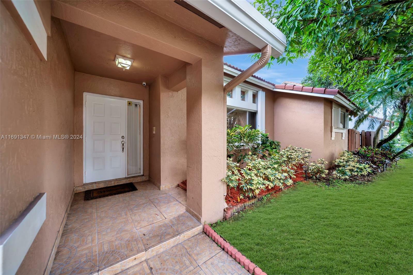 Property Photo:  9861 NW 28th Pl  FL 33065 