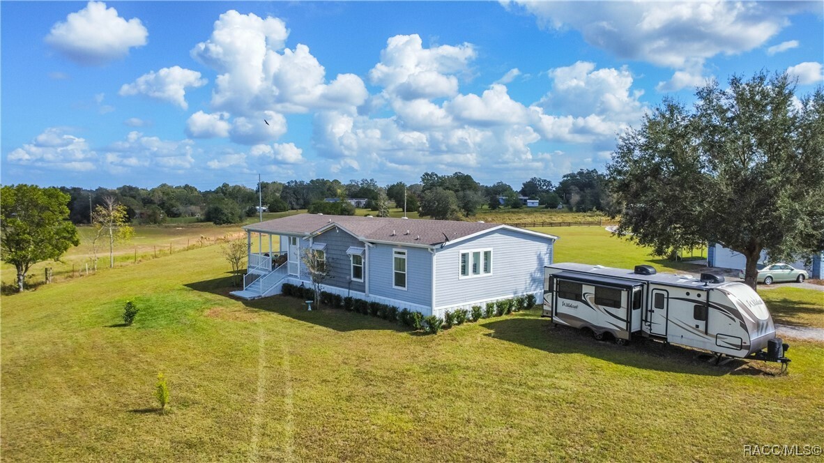 Property Photo:  10044 S Parkside Avenue  FL 34436 