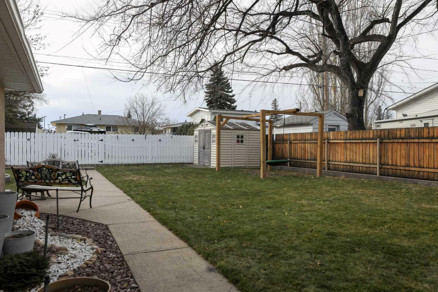 Property Photo:  4808 51 Avenue  AB T1G 1H1 