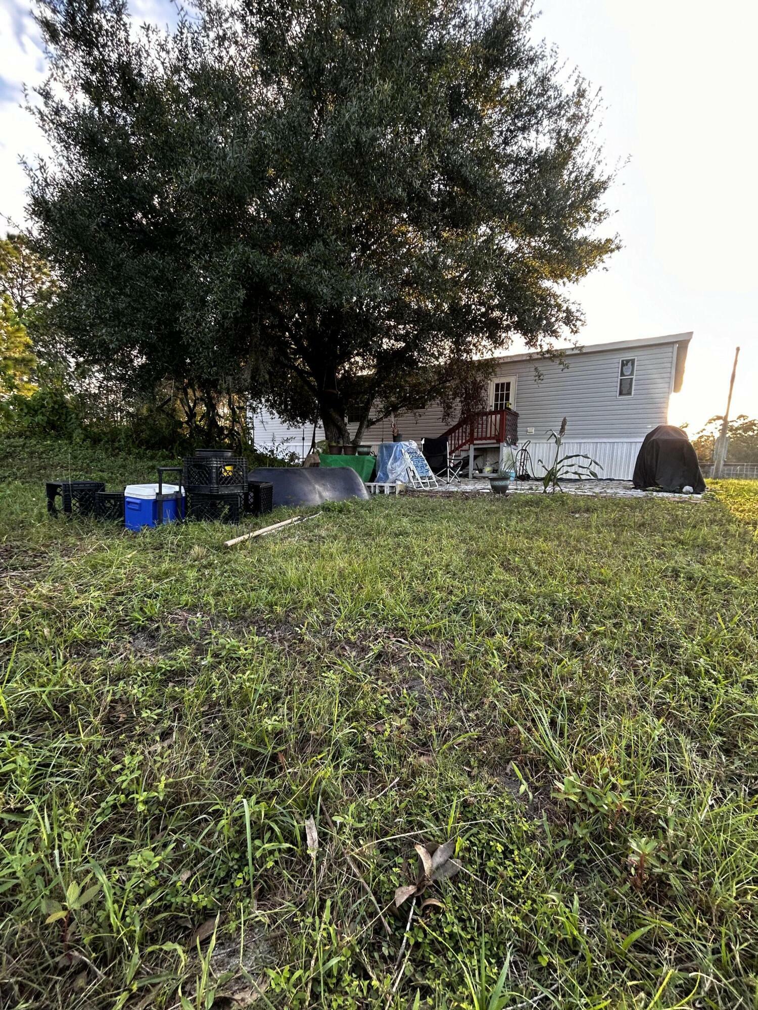 Property Photo:  115 W Marimba Circle  FL 33440 