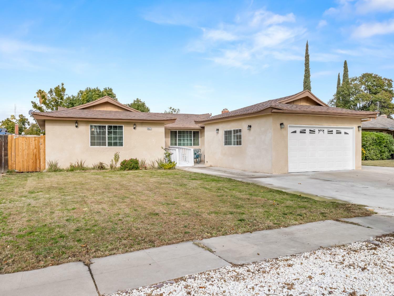 Property Photo:  4871 E Norwich Avenue  CA 93726 