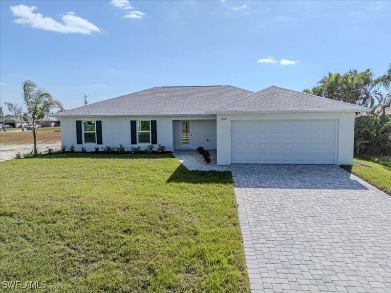 Property Photo:  1212 NW 17th Street  FL 33993 