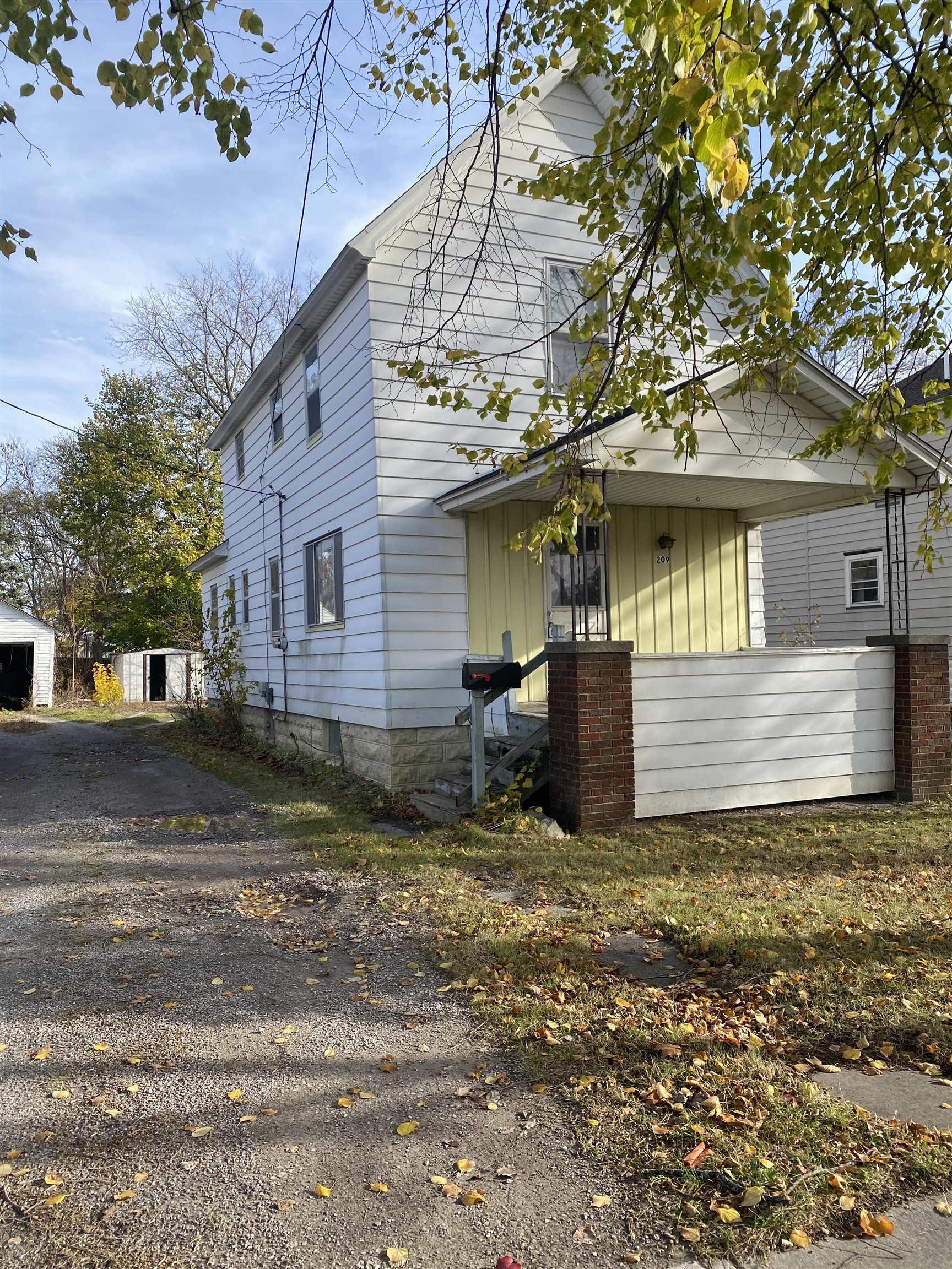 Property Photo:  209 Raymond Street  MI 48706 