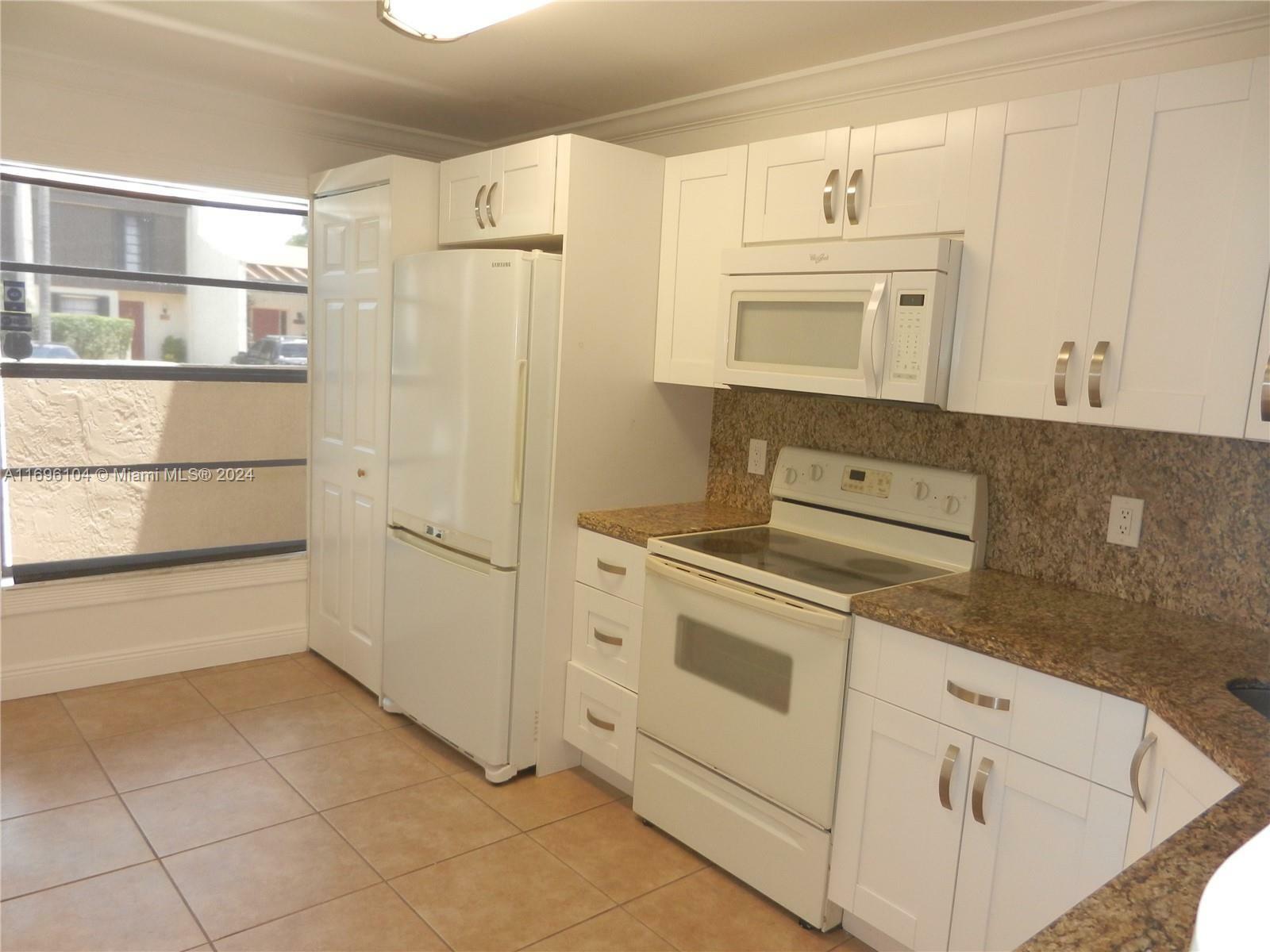 Property Photo:  9948 NW 10th St 6  FL 33024 