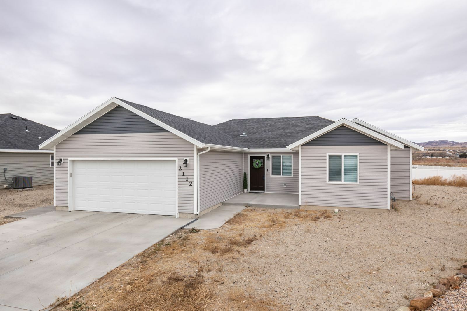 Property Photo:  2112 Village Green Circle  NV 89801 