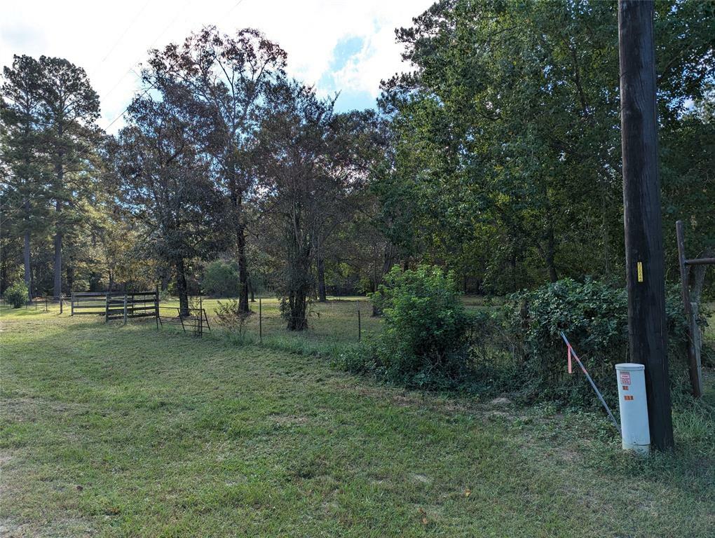 Property Photo:  11302 County Road 351  TX 77363 