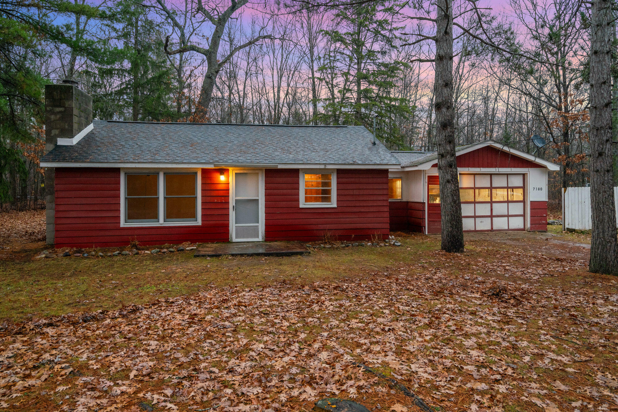 Property Photo:  7180 Fisher Woods Road  MI 49749 