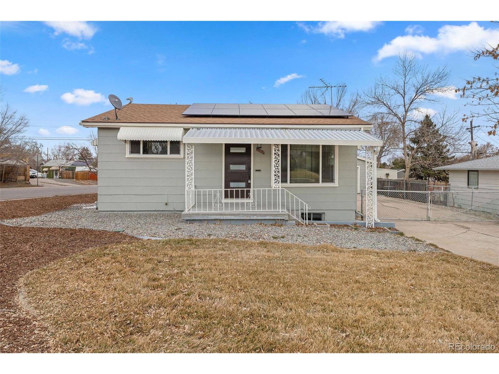 Property Photo:  1100 S Quitman St  CO 80219 