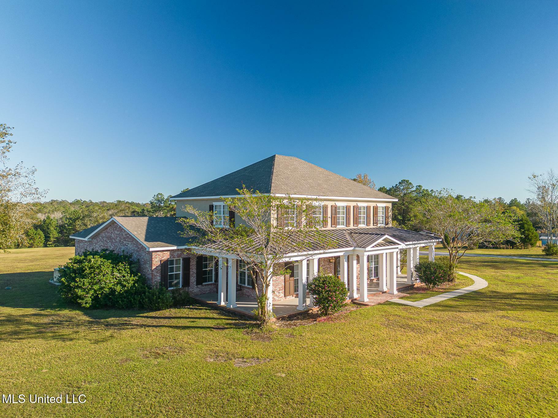 Property Photo:  19910 Red Oak Road  MS 39574 