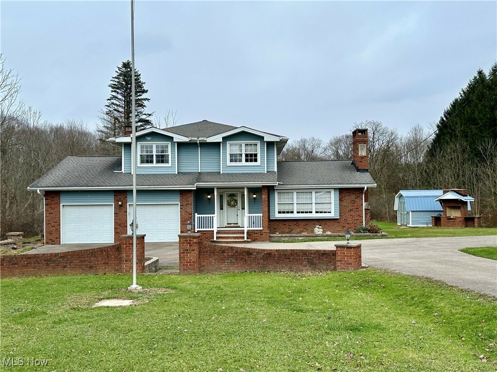 Property Photo:  13075 Taylor Wells Road  OH 44024 