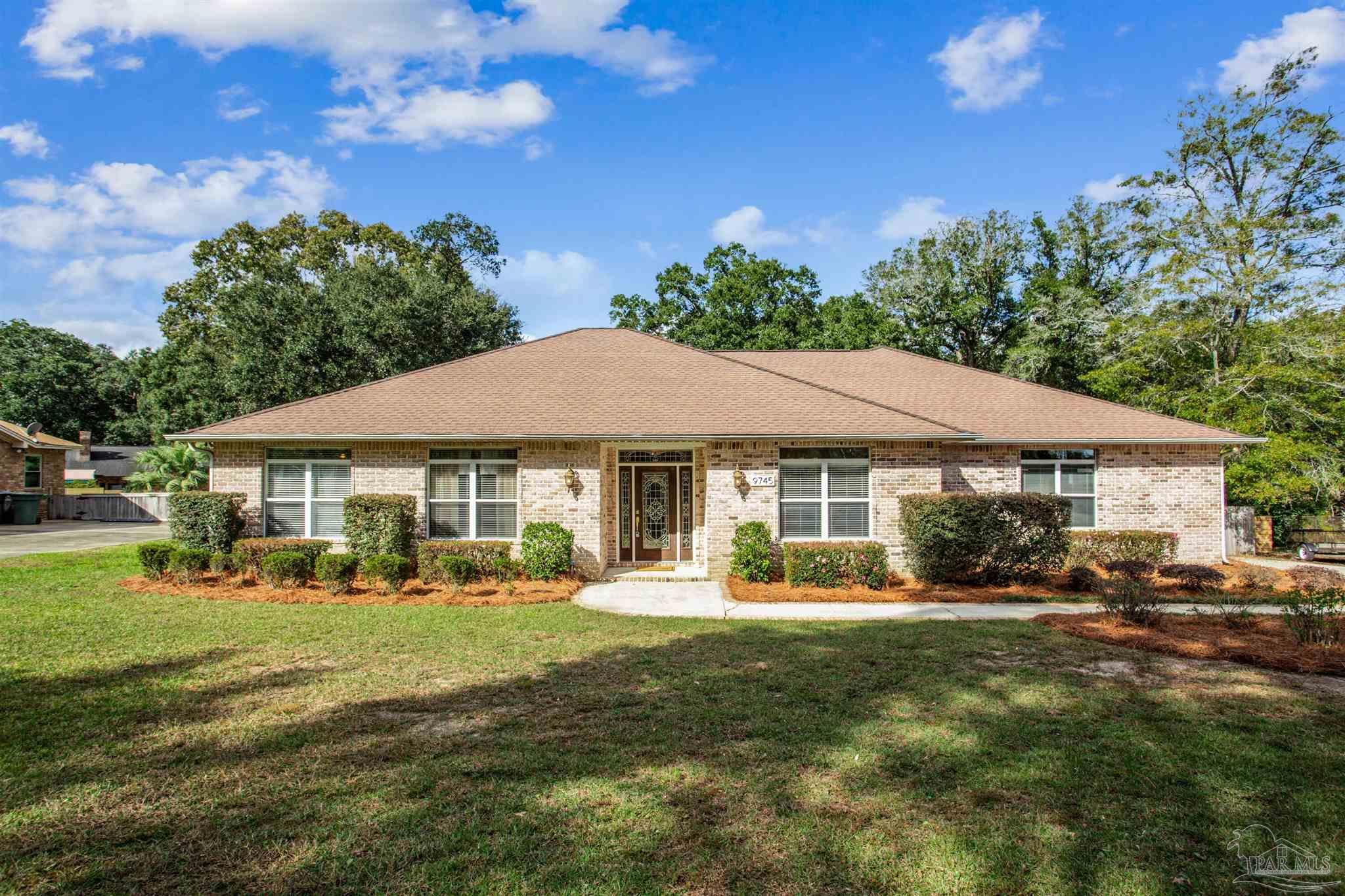 Property Photo:  9745 Quail Hollow Blvd  FL 32514 