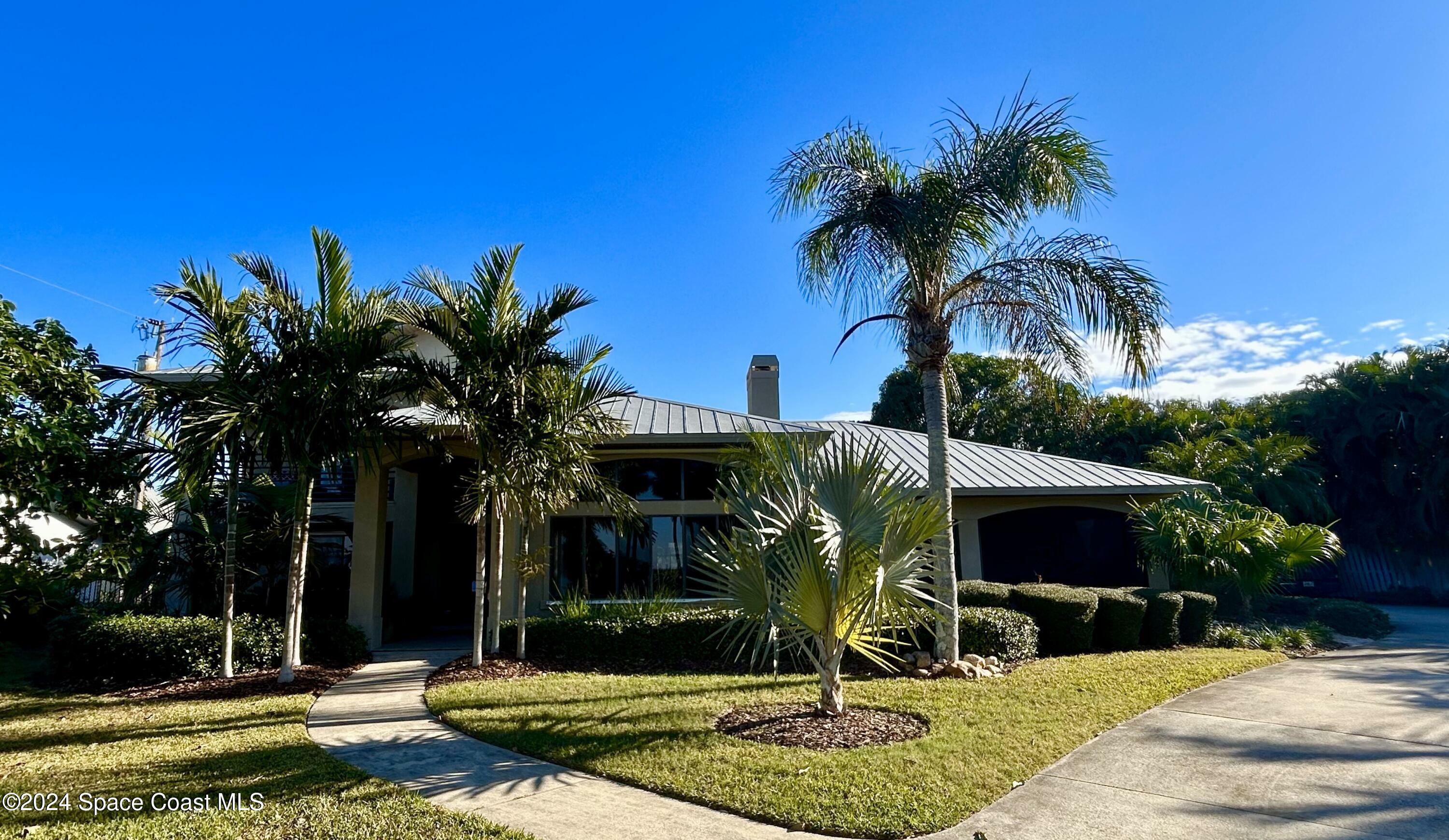 Property Photo:  10910 S Tropical Trail  FL 32952 