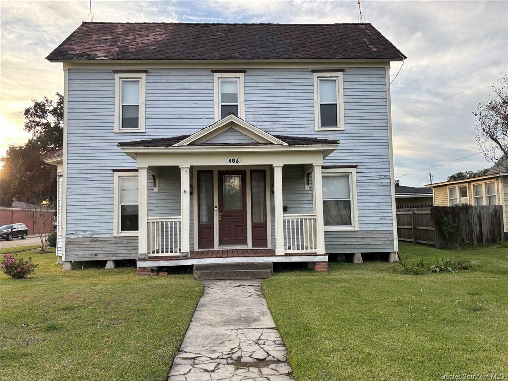Property Photo:  403 N Cutting Avenue  LA 70546 