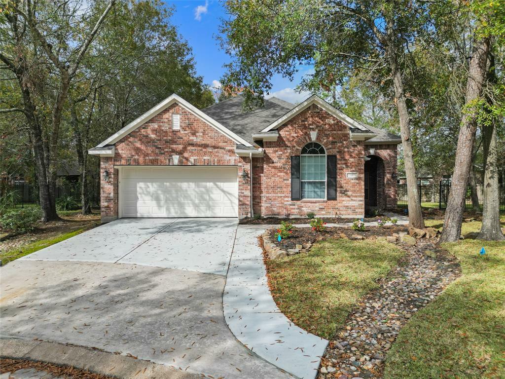 Property Photo:  15 London Green  TX 77384 