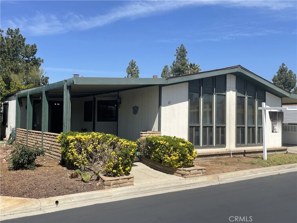 Property Photo:  13381 Magnolia Avenue 65  CA 92879 