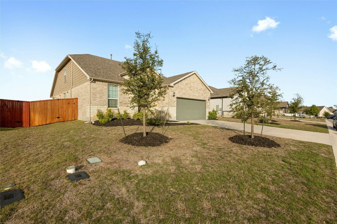 Property Photo:  315 Climbing Rock Loop  TX 78620 