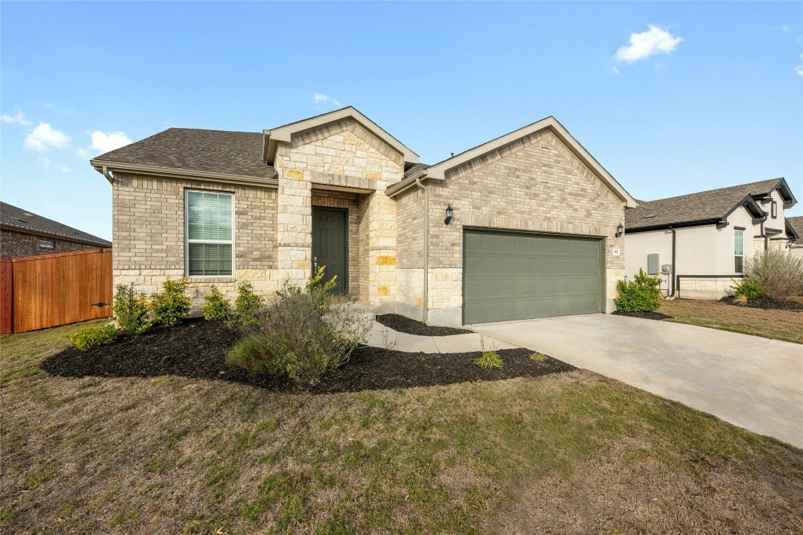 Property Photo: 315 Climbing Rock Loop TX 78620
