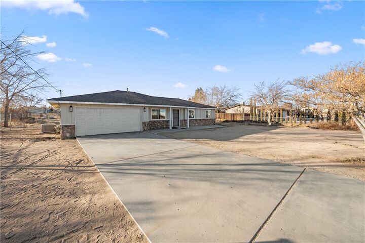 Property Photo:  11572 A Avenue  CA 92345 