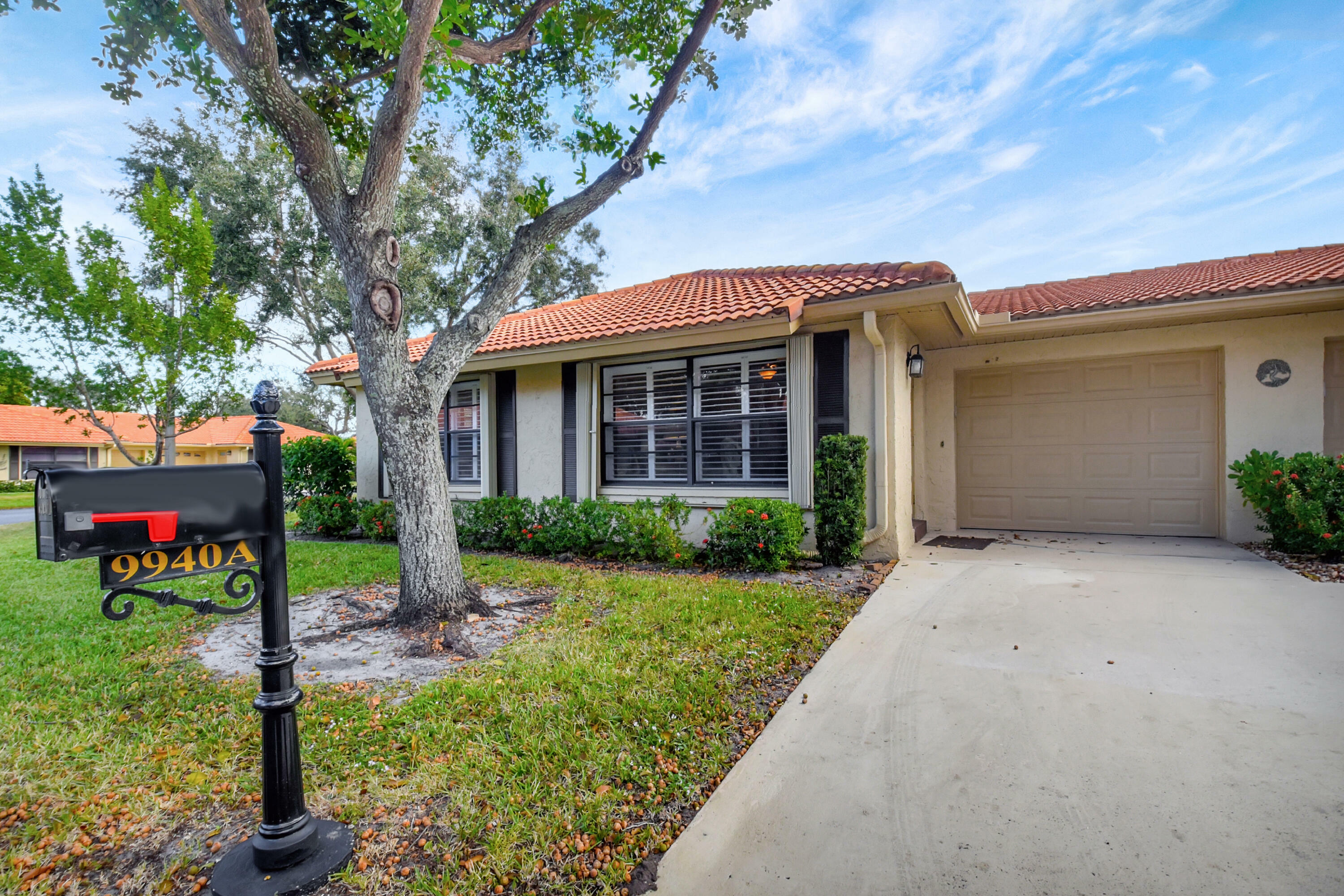 Property Photo:  9940 Pyracantha Tree Terrace A  FL 33436 