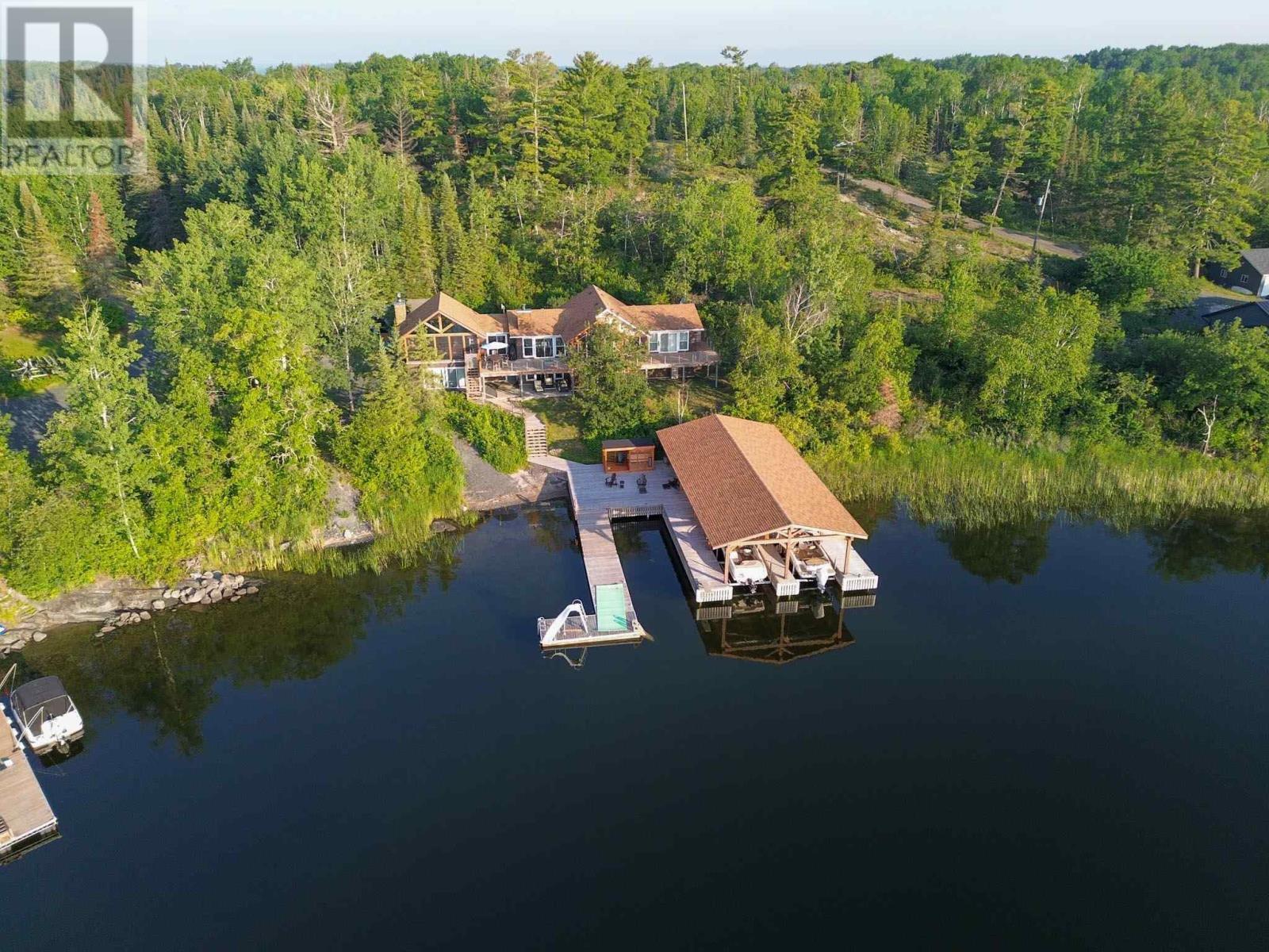 Photo de la propriété: 65 Poplar Bay Rd, McKenzie Portage Road ON P0X 1C0