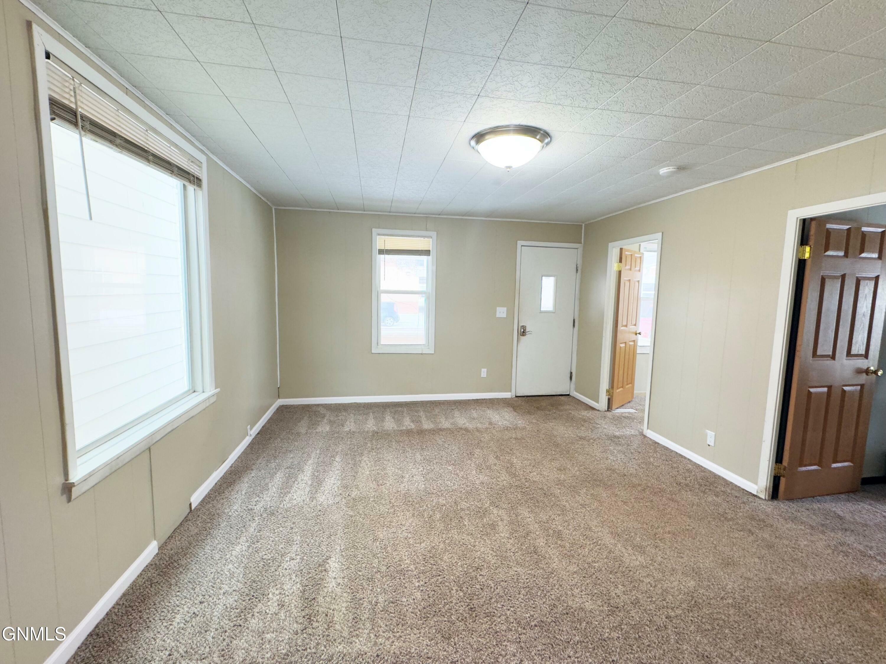 Property Photo:  202 1/2 Collins Avenue  ND 58554 