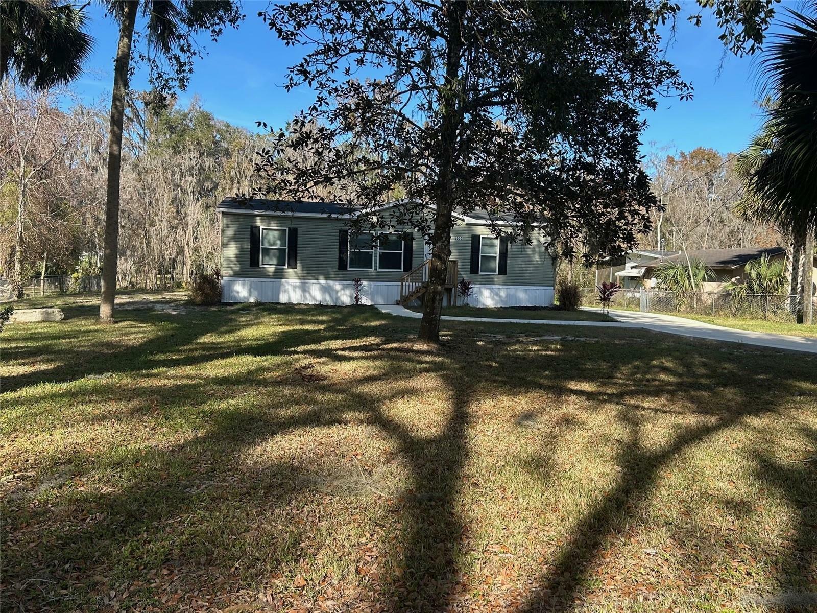 Property Photo:  2500 Cr 412  FL 33538 