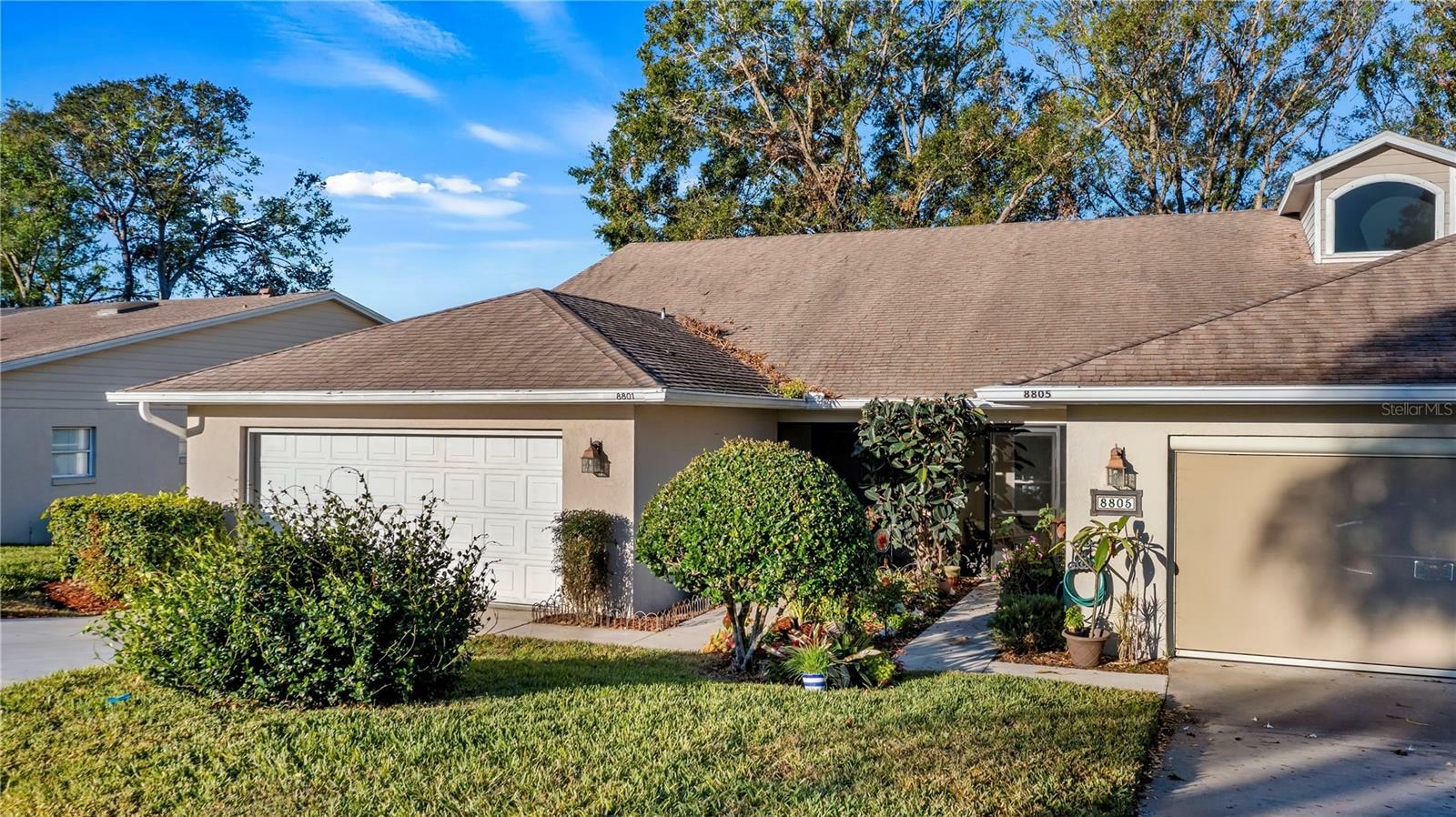 Property Photo:  8801 Village Green Boulevard  FL 34711 