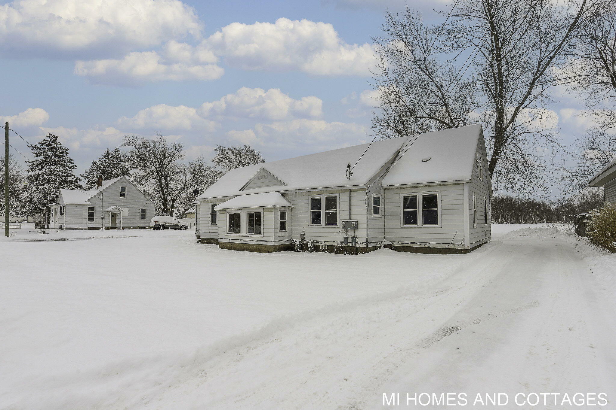 Property Photo:  6438 Adams Street  MI 49464 