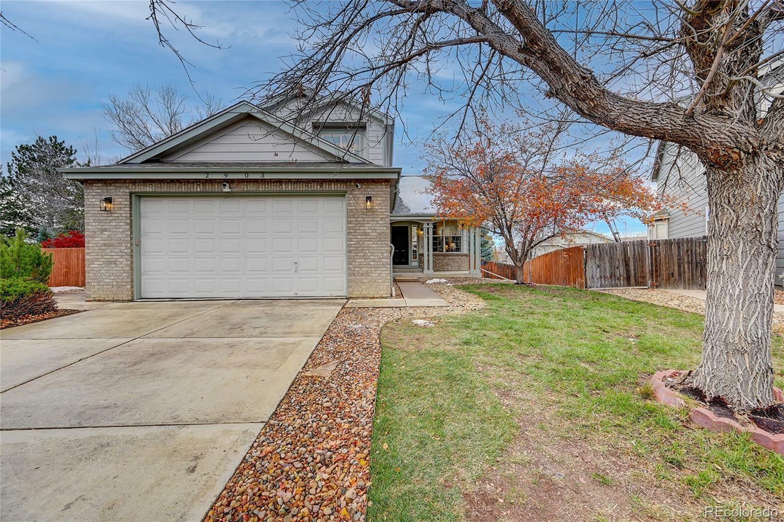 Property Photo:  2903 S Walden Way  CO 80013 