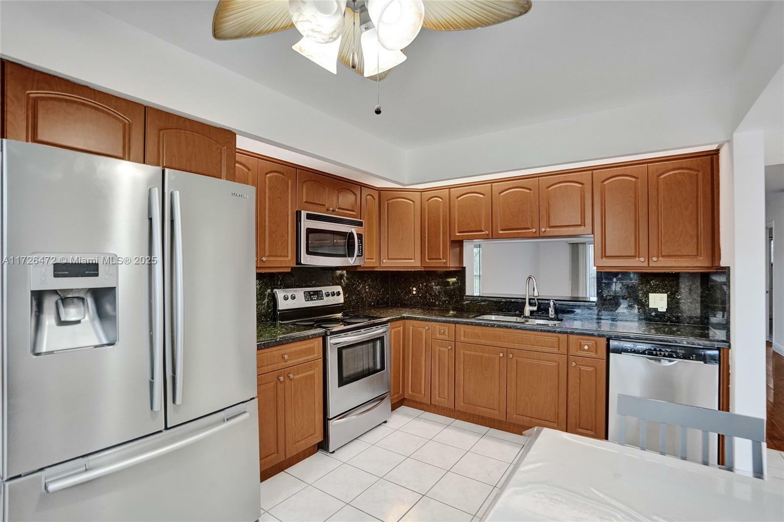 Property Photo:  1001 SW 128th Ter 207B  FL 33027 