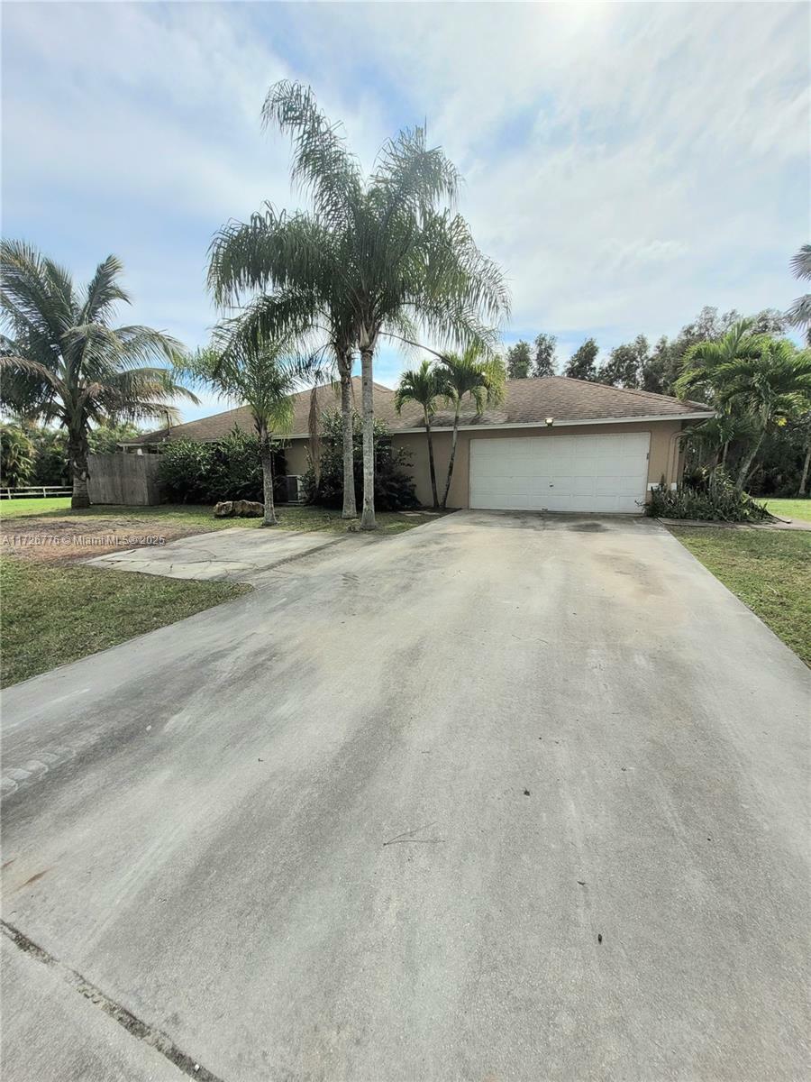 Property Photo:  7534 Coconut Blvd  FL 33412 