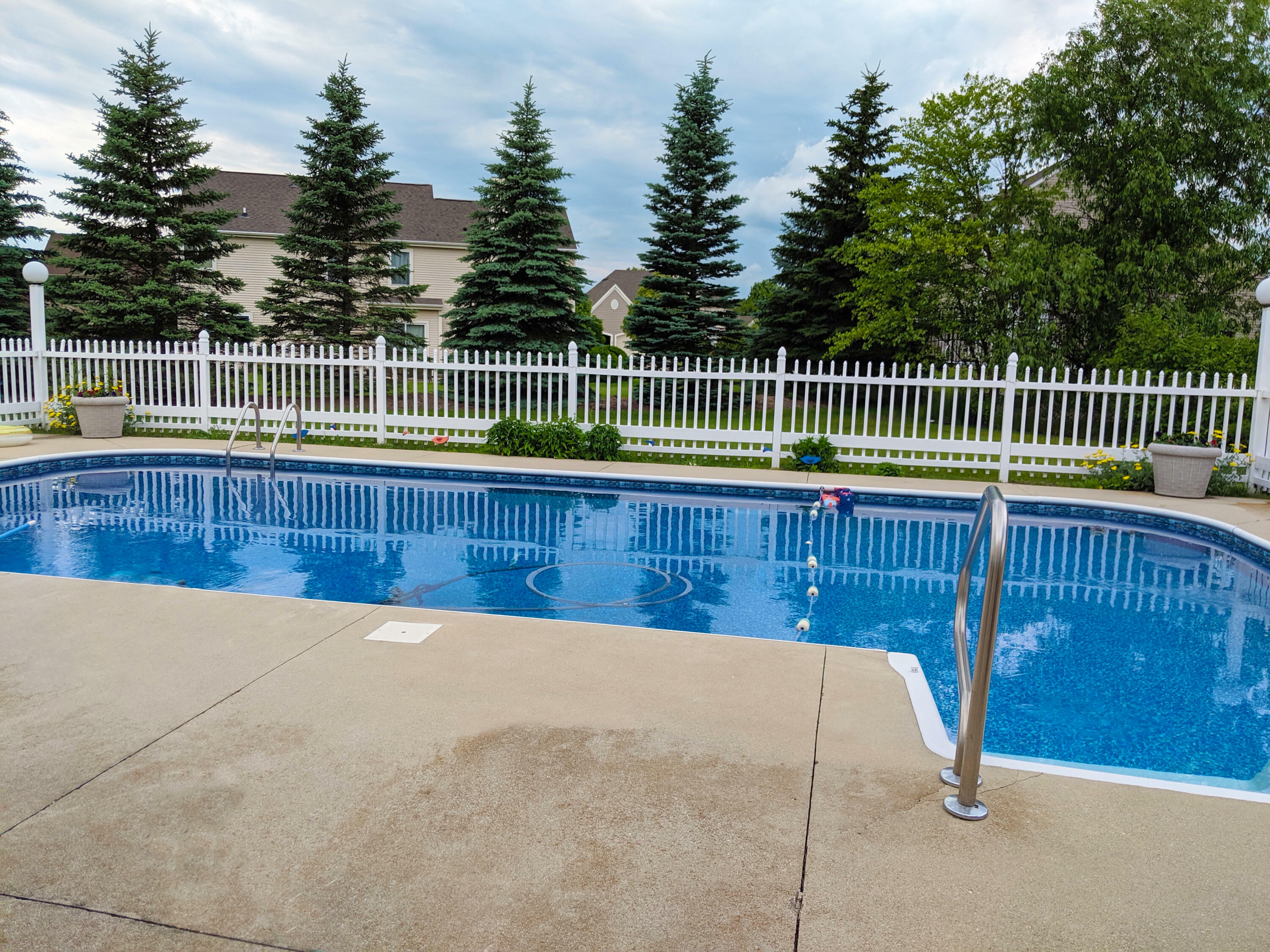 Property Photo:  W129s9759 Champions Ct  WI 53150 