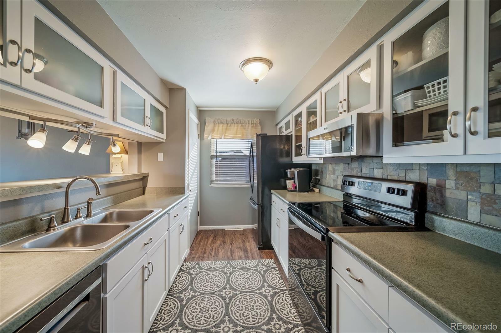 Property Photo: 7700 W Glasgow Place 19C CO 80128