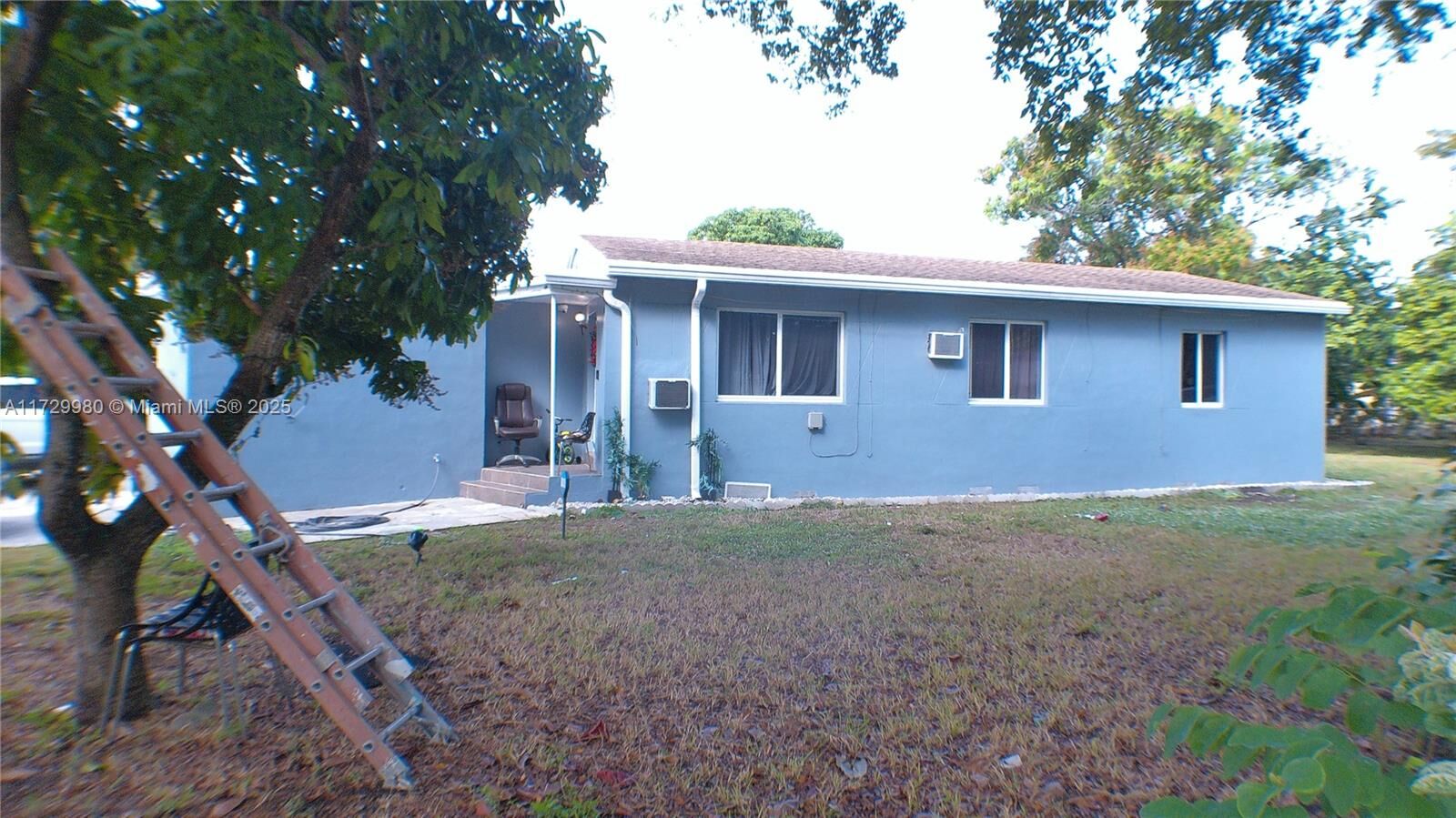 Property Photo:  405 NW 128th St  FL 33168 