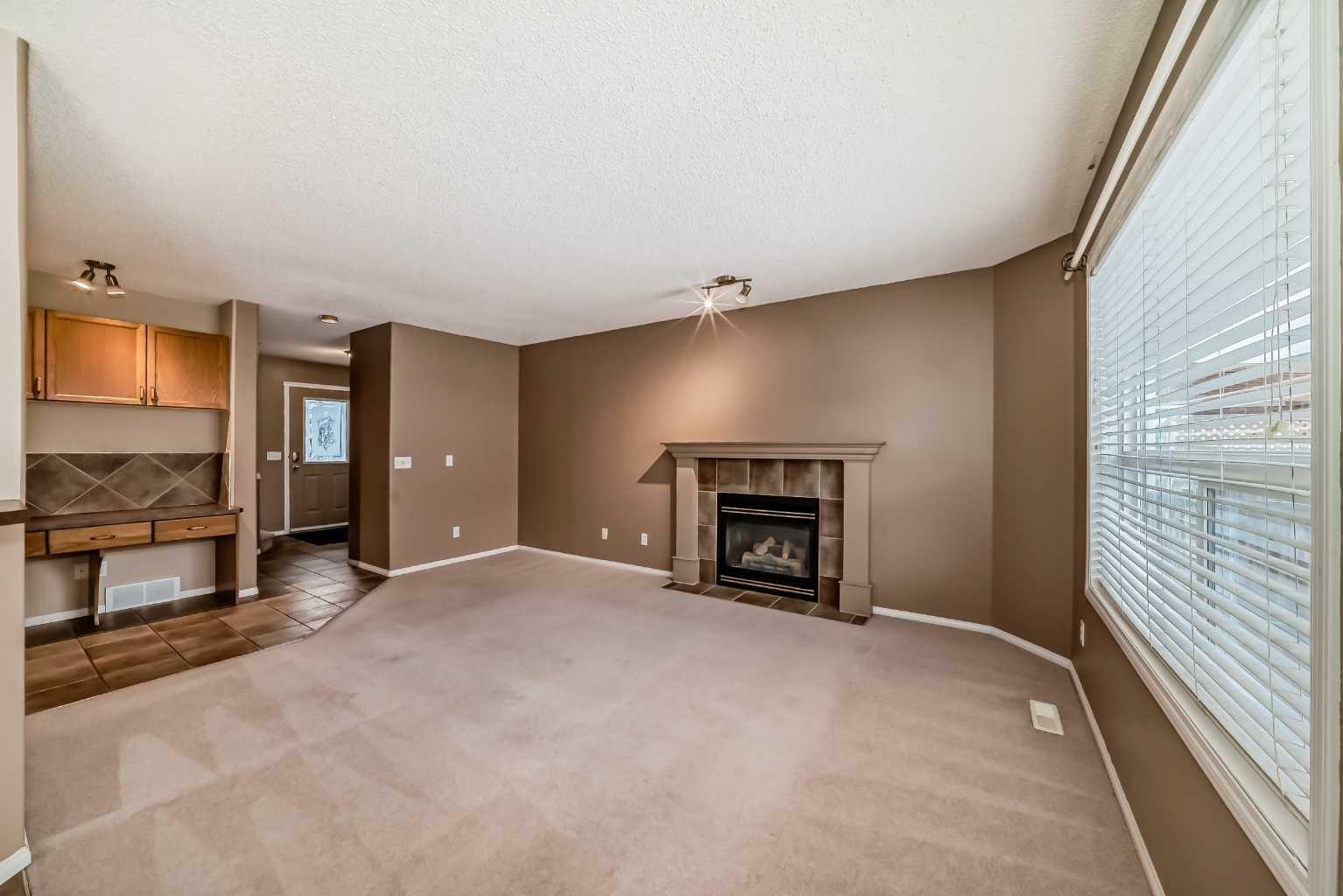 Property Photo:  154 Bridlewood Court SW  AB T2Y 3Z1 