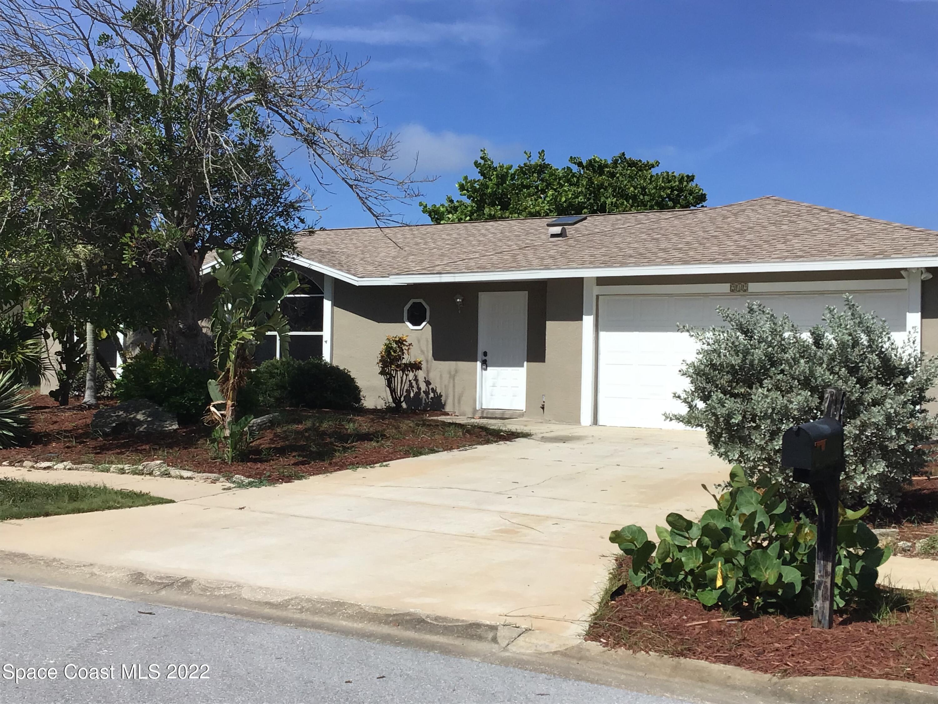 Property Photo:  212 Ocean Breeze Circle  FL 32903 