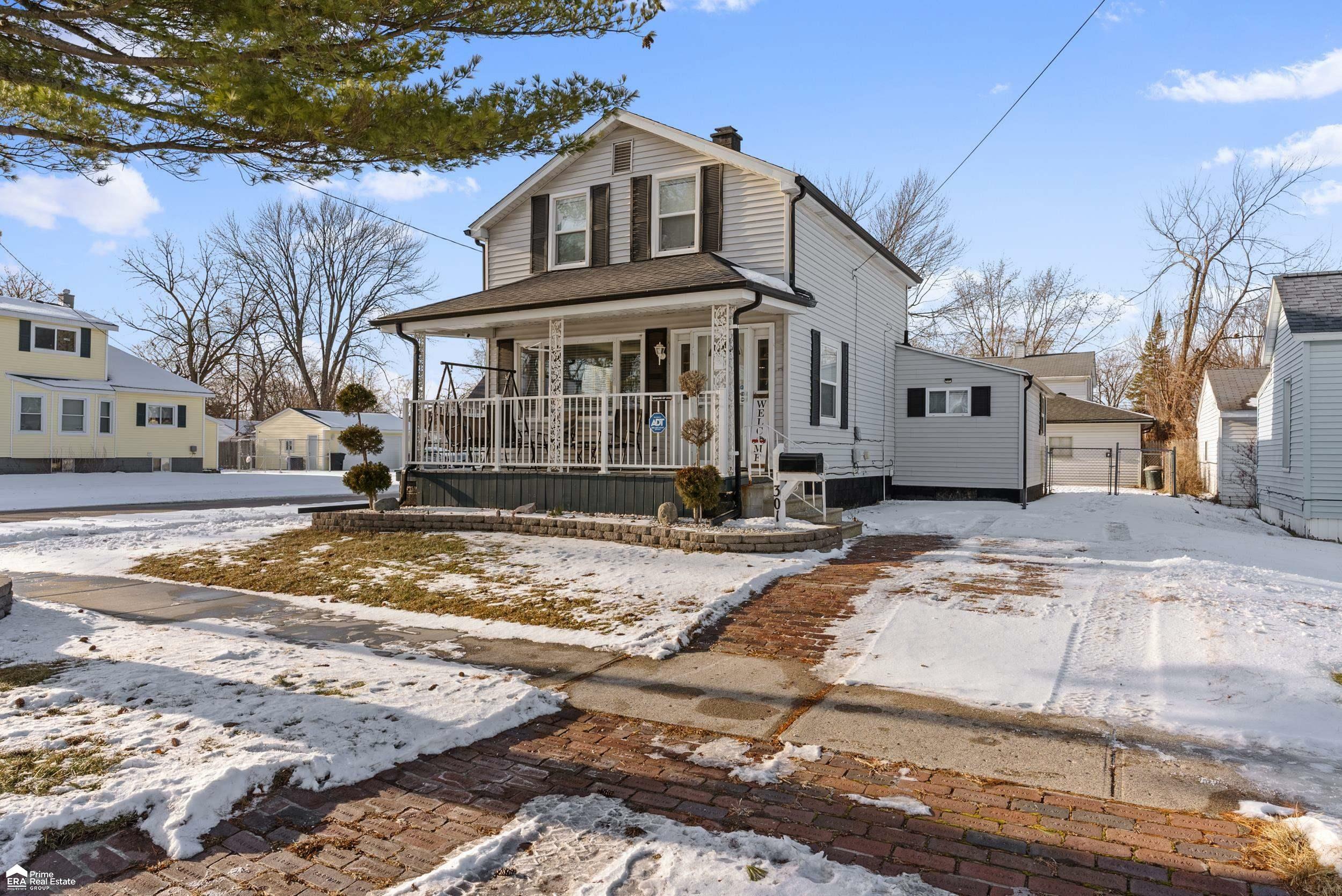 Property Photo:  301 N Bates Street  MI 48602 